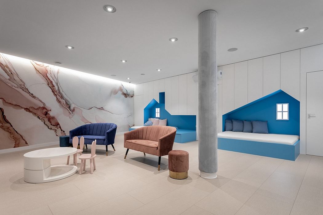 Contemporary lobby with striking marble walls, sculptural furniture, and vibrant blue accents.