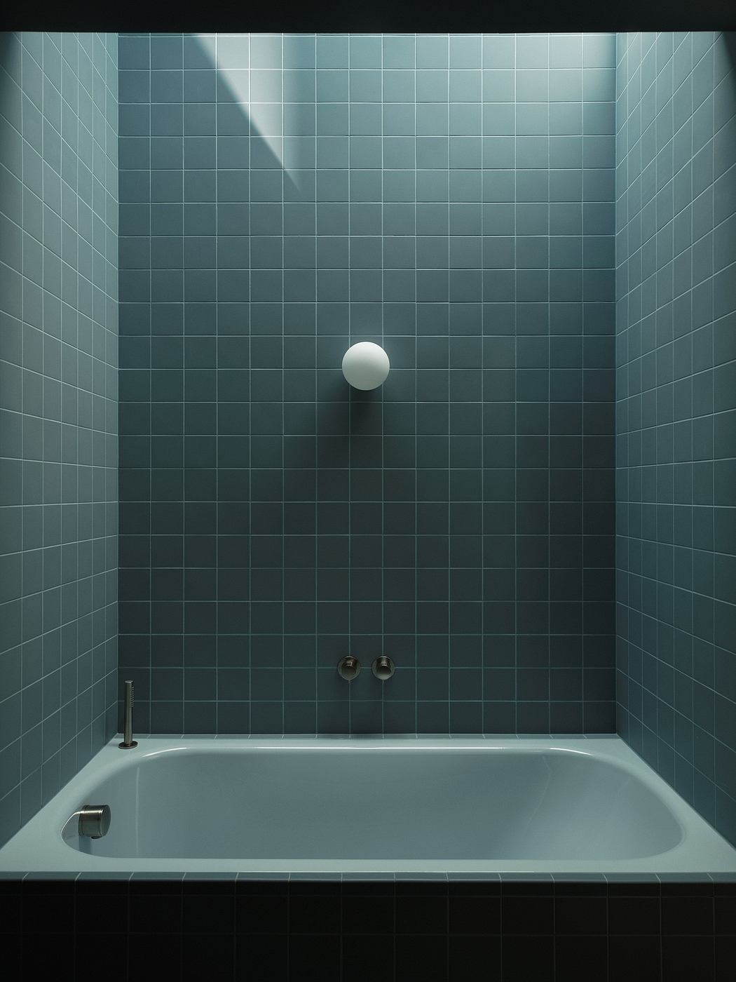 An architectural interior featuring a minimalist bathtub surrounded by a grid of green tiles, a single light fixture, and simple metallic fixtures.