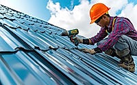 Construction worker installing new roof.