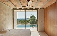 008-stepped-house-opens-up-to-views-across-iberian-hills-around-swimming-pool.jpg