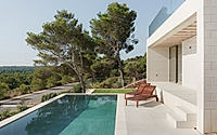 011-stepped-house-opens-up-to-views-across-iberian-hills-around-swimming-pool.jpg