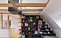 001-apartment-o-a-walkable-bookshelf-recasts-living-across-two-levels.jpg