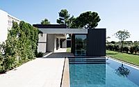 001-house-in-misano-adriatico-pairs-warm-wood-with-cool-stone-surfaces.jpg