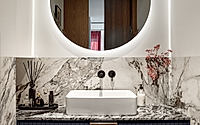 008-kss-apartment-frames-warm-modern-interiors-with-marble-and-velvet.jpg