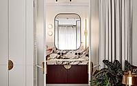 011-kss-apartment-frames-warm-modern-interiors-with-marble-and-velvet.jpg