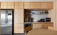 006-alma-apartment-reimagines-daily-living-with-a-social-kitchen-plan.jpg