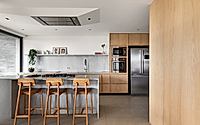 007-alma-apartment-reimagines-daily-living-with-a-social-kitchen-plan.jpg