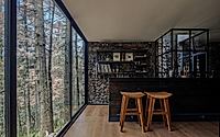 007-casa-oruc-a-dramatic-descent-from-pines-to-a-floating-forest-home.jpg