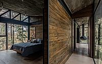 008-casa-oruc-a-dramatic-descent-from-pines-to-a-floating-forest-home.jpg