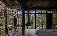 011-casa-oruc-a-dramatic-descent-from-pines-to-a-floating-forest-home.jpg