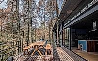 012-casa-oruc-a-dramatic-descent-from-pines-to-a-floating-forest-home.jpg