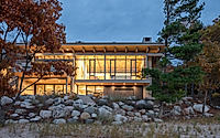 012-lower-shore-residence-reframes-family-living-with-a-four-season-room.jpg