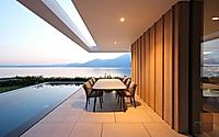 012-villa-dellago-opens-to-lake-light-through-twin-sunken-patios-below.jpg