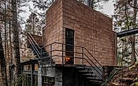013-casa-oruc-a-dramatic-descent-from-pines-to-a-floating-forest-home.jpg