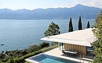 016-villa-dellago-opens-to-lake-light-through-twin-sunken-patios-below.jpg