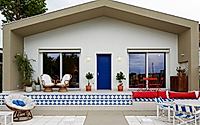 001-bollana-residence-color-rich-rooms-for-relaxed-coastal-living-in-italy.jpg