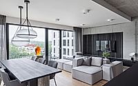 001-marina-nova-refines-industrial-calm-in-a-riverfront-prague-apartment.jpg