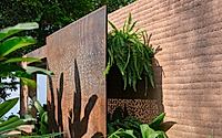 015-studio-house-rammed-earth-villa-open-to-pacific-breeze.jpg