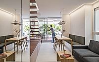 005-casa-binome-reimagining-a-madrid-duplex-around-a-living-stair-core.jpg