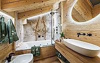 009-residence-in-cortina-reveals-textured-stone-craft-for-alpine-living.jpg