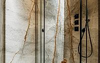 011-residence-in-cortina-reveals-textured-stone-craft-for-alpine-living.jpg