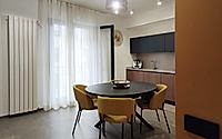 005-apartment-on-via-falcone-frames-warm-modern-living-in-marcianise-italy.jpg