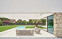 008-914-js3-reframes-coastal-living-with-deep-porches-and-pool-courtyard.jpg