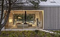 015-kownatki-lake-house-calm-geometry-metal-clad-refuge-in-the-pines.jpg