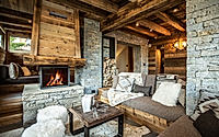 001-kelly-chalet-warms-alpine-stone-and-timber-with-soft-luxury-inside.jpg