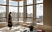 002-ren-apartment-double-height-veranda-living-above-nova-lima-skies.jpg