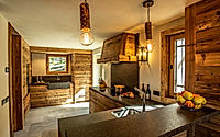 010-kelly-chalet-warms-alpine-stone-and-timber-with-soft-luxury-inside.jpg