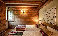 015-kelly-chalet-warms-alpine-stone-and-timber-with-soft-luxury-inside.jpg