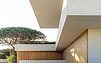017-casa-nau-64-rewrites-courtyard-living-between-pines-and-lagoon-light.jpg