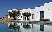 001-fanos-guesthouse-island-courtyard-living-shaped-by-wind-and-greek-sun.jpg