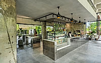 003-phum-sambo-cafe-eatery-concrete-frame-turned-green-dining-retreat.jpg