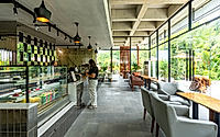 004-phum-sambo-cafe-eatery-concrete-frame-turned-green-dining-retreat.jpg