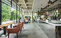 005-phum-sambo-cafe-eatery-concrete-frame-turned-green-dining-retreat.jpg