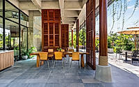 007-phum-sambo-cafe-eatery-concrete-frame-turned-green-dining-retreat.jpg