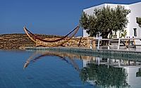 008-fanos-guesthouse-island-courtyard-living-shaped-by-wind-and-greek-sun.jpg