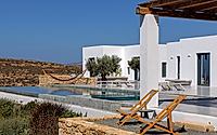 009-fanos-guesthouse-island-courtyard-living-shaped-by-wind-and-greek-sun.jpg