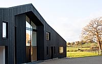 010-hartdene-barns-charred-timber-eco-homes-in-the-english-countryside.jpg