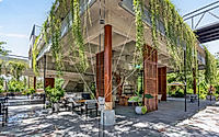 011-phum-sambo-cafe-eatery-concrete-frame-turned-green-dining-retreat.jpg