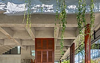 012-phum-sambo-cafe-eatery-concrete-frame-turned-green-dining-retreat.jpg
