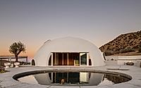 018-hata-dome-captures-mountain-horizons-with-a-sculpted-monolithic-shell.jpg