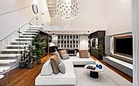 003-urban-villa-in-milan-balances-light-warmth-and-height-inside.jpg