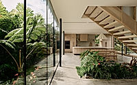 004-kailua-house-reveals-a-jungle-lined-retreat-for-gatherings-by-the-shore.jpg