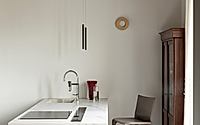 005-casa-frara-punto-zero-reworks-a-historic-apartment-in-ferrara-italy.jpg