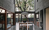 008-ms-house-brutalist-concrete-wrapped-around-nine-ancient-neem-trees.jpg