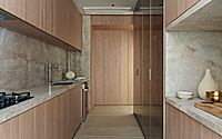009-ceramica-apartment-shapes-calm-interiors-through-warm-stone-and-wood.jpg