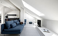 001-sky-loft-renovation-brings-light-to-a-1970s-turin-attic-apartment.jpg